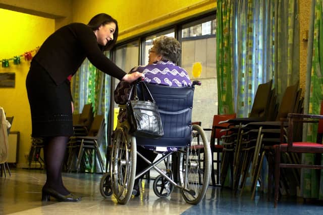 PIC BY ESME ALLEN FOR STOCKNurse in a care home talking to an elderly woman in a wheelchairPENSIONS, PENSIONERS, POVERTY, OLD, AGEING, POOR, BENIFITS, SOCIAL SECURITY, CARING, DISABLED, CAREERS, VOLUNTEERS, HOUSING, RETIREMENT