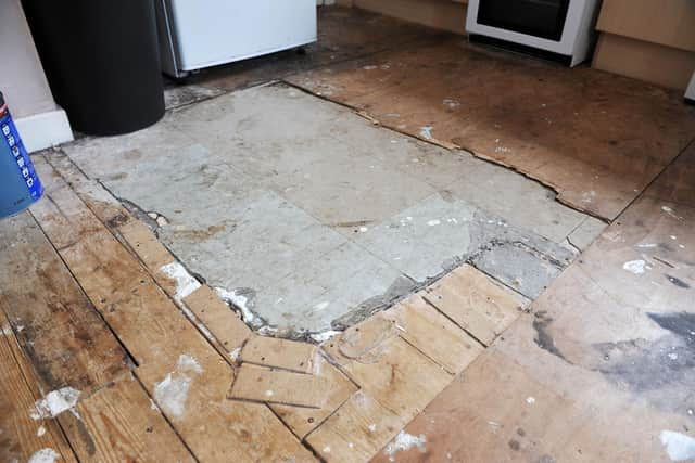 The tiles containing asbestos in the tenant's kitchen have exposed for over a year