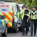 Police Scotland to double its presence in border areas as new restrictions are put in place.