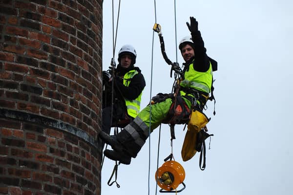 Rosebank Distillery's chimney is undergoing repairs by rope access contractors SG Access Solutions Ltd. Picture: Michael Gillen.