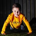 Aaron McComb, of Shieldhill, raised funds for Strathcarron Hospice by doing 25 push ups a day for two weeks in memory of his late gran. Picture: Scott Louden.