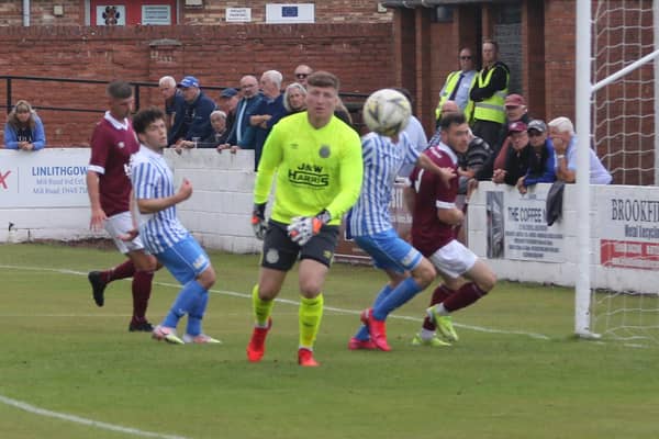 Linlithgow keeper Lewis McMinn looks on as Penicuik launch an attack (Pic by Jim Dick)