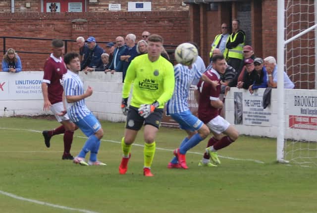 Linlithgow keeper Lewis McMinn looks on as Penicuik launch an attack (Pic by Jim Dick)