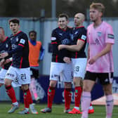 Blair Alston, third from left, receives his team mates' plaudits after opening the scoring for Falkirk in the 25th minute of their home game on Saturday at Peterhead (picture by Michael Gillen).