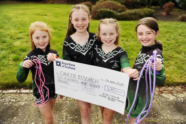 Callie Weir, Ruby Taylor, Sophia Hunter and Lola-Rose Connaghan, from the Kidd-Cieslak School of Irish Dance in Denny raised £670 for Cancer Research UK through the challenge.  (Pic: Alan Murray)