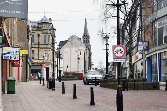 Falkirk town centre very quiet in the hours ahead of Prime Minister Boris Johnson announcement of an effective lockdown for the UK. Pic: Michael Gillen