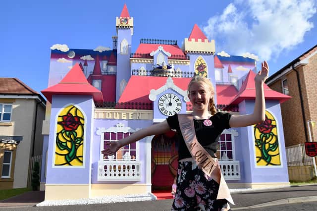 2022 Queen Aimee Gilchrist with her Beauty and the Beast-themed castle