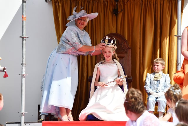 Pamela Millar places the crown on Queen Aimee Gilcrest