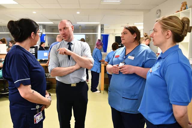 Health Minister Neil Gray heard about the pressures on A&E at FVRH when he visited last week, left to right, Joanne Auld, senior charge nurse,; Siobhan Griffin, deputy charge nurse; and Hannah Spruce, clinical nurse educator. Pic: Michael Gillen