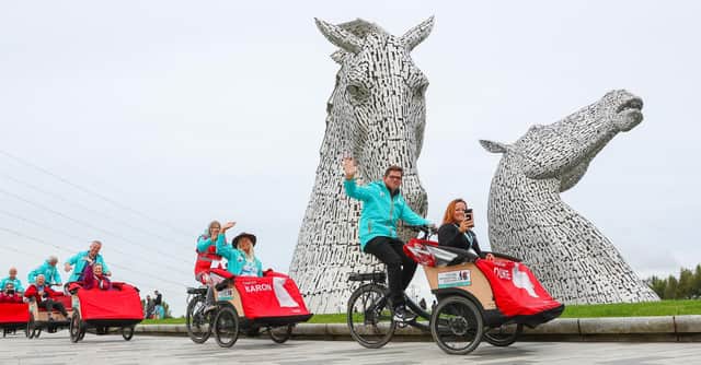 Thirty Trishaws completed a ride from the Falkirk Stadium to the Kelpies on Friday to mark CWAS's fifth anniversary.  (Pic: Scott Louden)