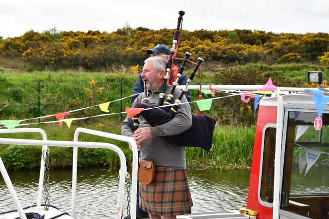 Local piper Neil Clark of Falkirk Piping played on board the Barr Seagull.