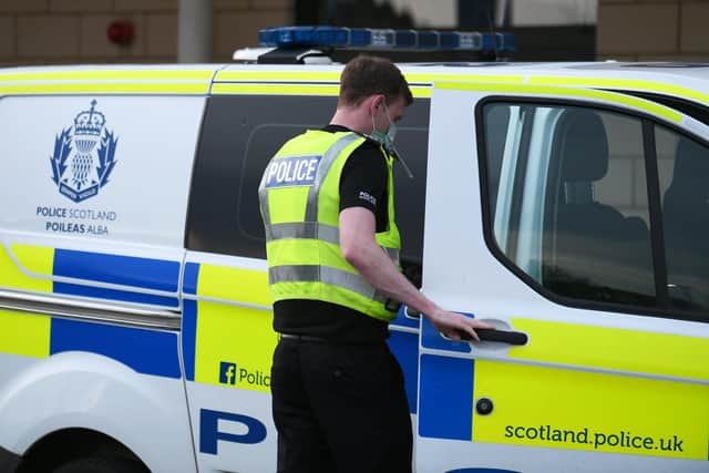 Three police officers have been injured after they were attacked in the car park of Stirling railway station.