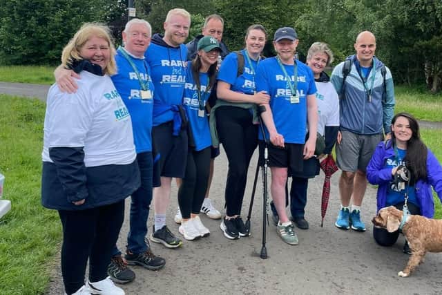 Andrew with friends and family on the Rare but Real walk. Pic: Contributed