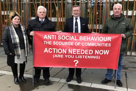 Councillor Billy Buchanan with MSP Alexander Stewart, second right, and two campaigners