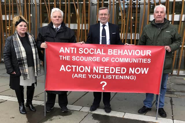 Councillor Billy Buchanan with MSP Alexander Stewart, second right, and two campaigners
