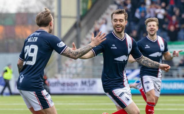 Brad Spencer wheels away to celebrate after scoring for Falkirk against Dunfermline Athletic (Photo: Mark Scates/SNS Group)