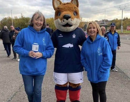 Scot Baby Box volunteers meet Falkirk mascot Fergus the Fox. Pic: Contributed