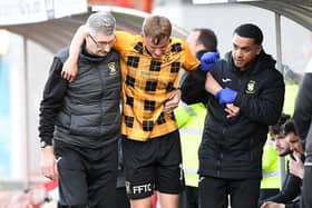 HAMILTON, SCOTLAND - MAY 12: East Fife's Sam Denham goes off injured and has to be helped off during a cinch League One play-off semi-final second leg match between Clyde and East Fife at New Douglas Park, on May 12, 2023, in Hamilton, Scotland.  (Photo by Craig Foy / SNS Group)