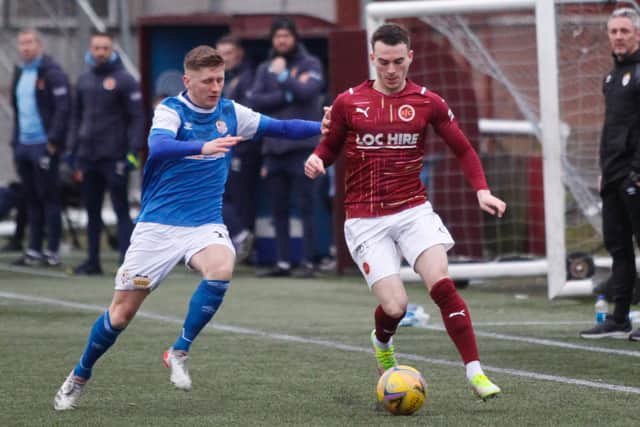 Adam Brown moves past Cowdenbeath's Bobby Barr
