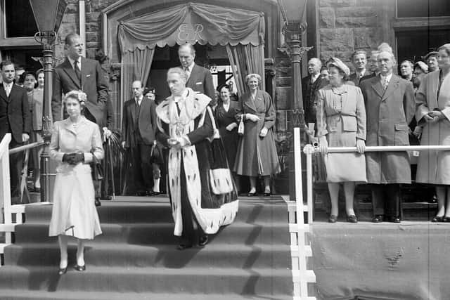 The Queen and Duke of Edinburgh leaving the Burgh Buildings on her first visit to Falkirk in 1955.