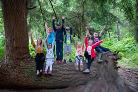 Sophie Whittaker, marketing co-ordinator at CALA Homes (West), with Under The Trees project members in Callendar Park, Falkirk. Picture: Paul Chappells.