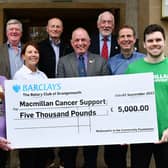 The Rotary Club of Grangemouth received £5000 from McDonalds towards their charity golf day. Pictured: Front row, club president, Alison Meikle; Sharon Stewart, McDonald's; club secretary, Eddie Collier; Elliot Jardine, McDonald's and Matt Smith, Macmillan Cancer Support relationship fundraising manager, Scotland North & East. Back row, Rotary members Alan Graham, Mark Fotheringham and George Nichol. Pic Michael Gillen