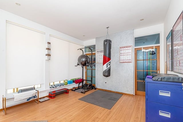 Bungalow interior, currently used as a gym.
