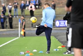 Max Christie shows off his keepie uppie skills on touchline during Saturday's win (Pics by Alan Murray)