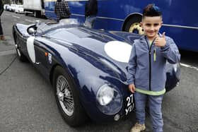 Lazo Hakim (7) and a D-type Jaguar at last year's Bo'ness Transport Festival.  (Pic: Alan Murray)