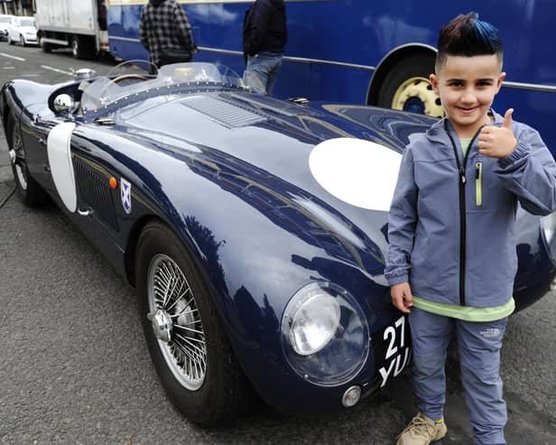 Lazo Hakim (7) and a D-type Jaguar at last year's Bo'ness Transport Festival.  (Pic: Alan Murray)