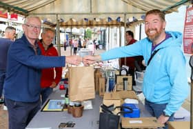 Another satisfied customer - Jim Bird buying goods from Pete Rossborough.
