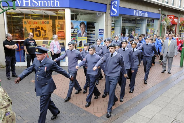 Cadets watched by members of the public in La Porte Precinct.