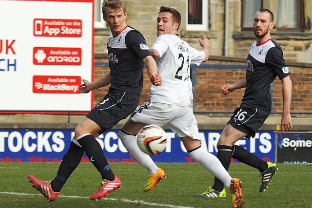 Lewis Vaghan's glancing header slides across the goalmouth