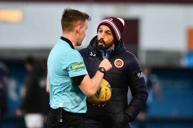Stenhousemuir manager Stephen Swift speaks to the match referee