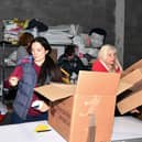 Volunteers at the Larbert hub sorting out the donations for the Scottish Preloved Baby Box Appeal
