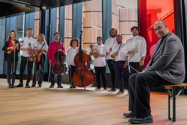 Des Oliver and Chineke! Orchestra prepare to perform at the specially commissioned piece at Rosebank Distillery. Pic: Contributed