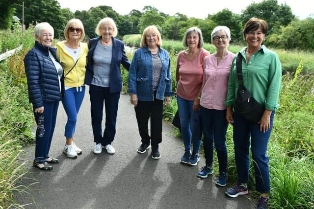 The Carronshore Step Forth walking group head along the River Carron path. Pic: Michael Gillen