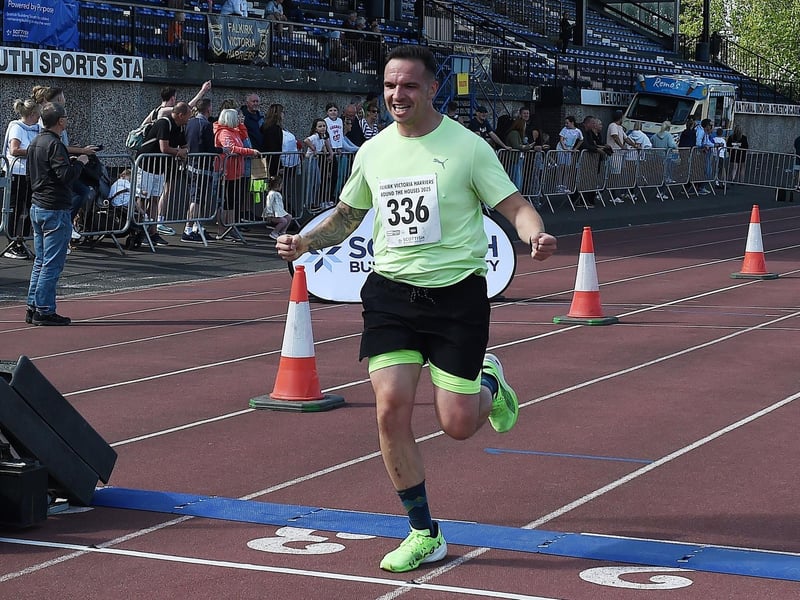 Ya beauty! This competitor shows a real sense of triumph and accomplishment as he crosses the finish line