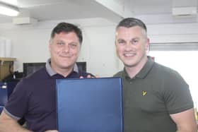 Dunipace captain Danny Ashe, right, is presented with a salver to mark his testimonial by manager Danny Smith. Pic: Contributed