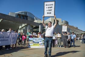 Campaigners protest outside the Holyrood parliament over the Scottish Government's plans to license short-term lets (Picture: Lisa Ferguson)