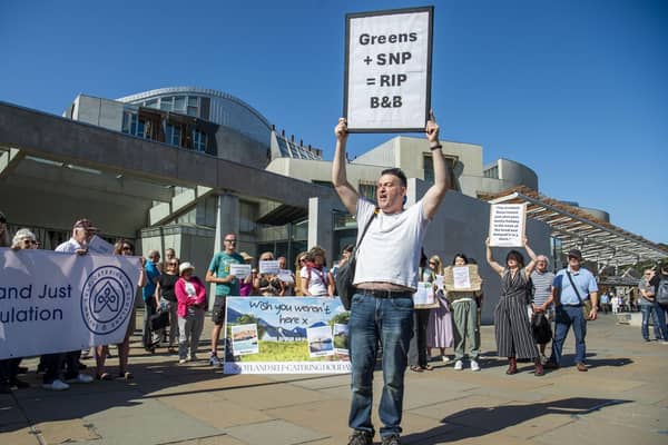 Campaigners protest outside the Holyrood parliament over the Scottish Government's plans to license short-term lets (Picture: Lisa Ferguson)