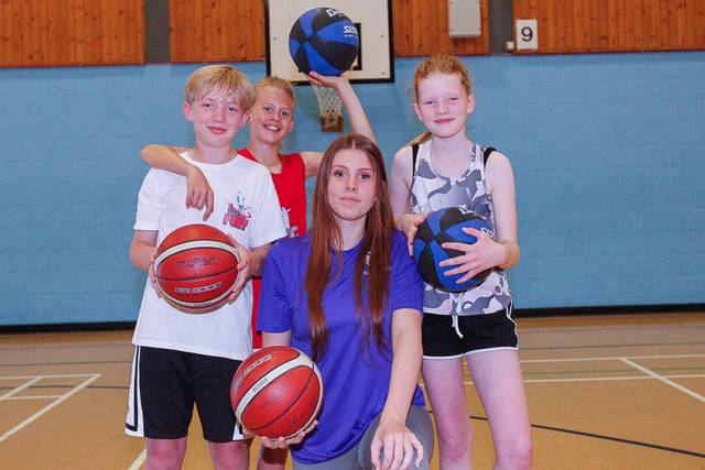 Falkirk Fury player and coach Abby Reid with Jay, Harry and Tia