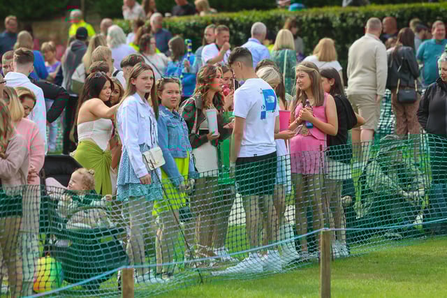 Crowds gather in Glebe Park ahead of the event.