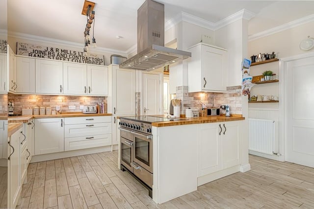 The kitchen has an excellent range of floor and wall units, Belfast sink, Rangemaster cooker with induction hob, washing machine, dishwasher and Porcelanosa flooring which covers the entire floor area.