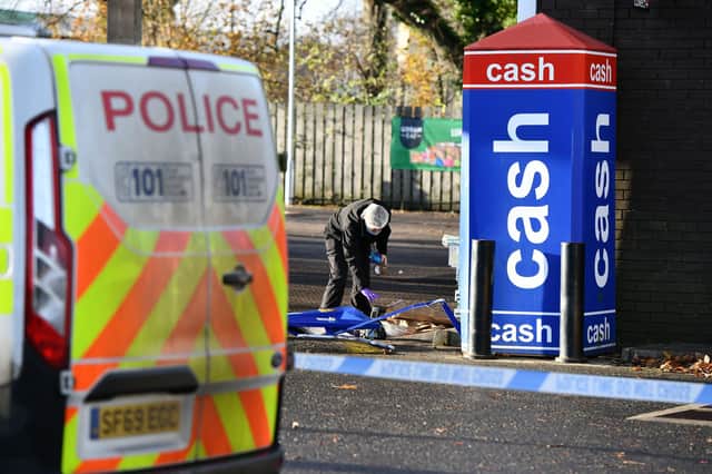 Police were on the scene at the Dean Road petrol station earlier today. Photo by Michael Gillen.