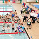 The teams taking part in the Rotary Club of Falkirk Swimarathon 2025 along with club members.