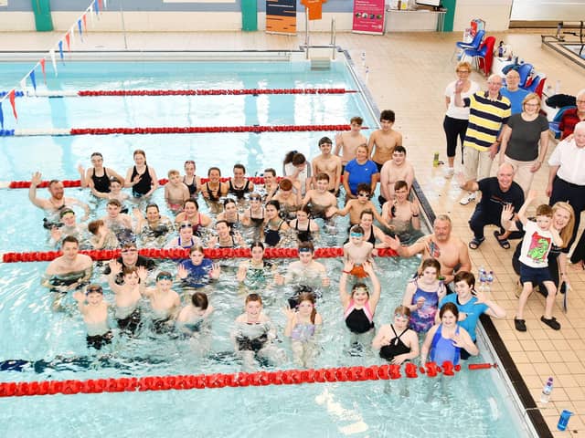 The teams taking part in the Rotary Club of Falkirk Swimarathon 2025 along with club members.