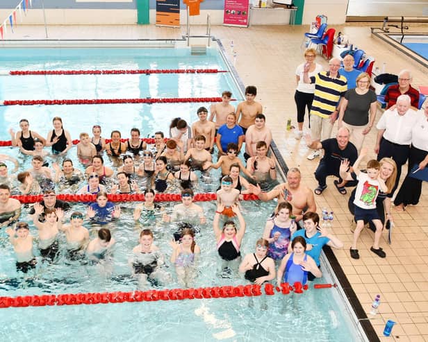 The teams taking part in the Rotary Club of Falkirk Swimarathon 2025 along with club members.
