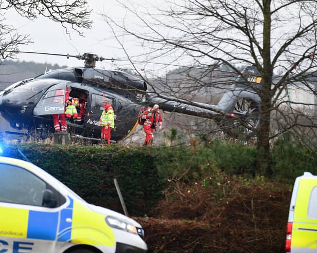 The air ambulance arrives at the scene. Pic: Michael Gillen