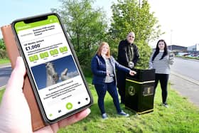 Launching the Litter Lotto app are Councillor Bryan Deakin and local residents Clare Gibson, left and Caitlin Duncan. Pic: Falkirk Council